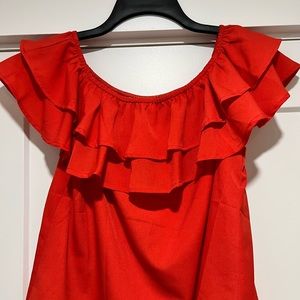 By Egreis top. Never worn! Tags removed.